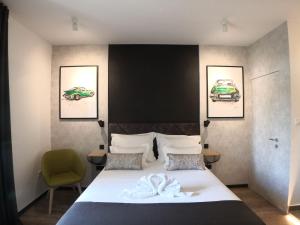 Posteľ alebo postele v izbe v ubytovaní Scuderia Split Rooms