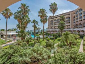 a view of the resort from the garden at #Cannes Boccacabana Beach, Seafront, in Résid Pierre&Vacances 3 Stars in Cannes