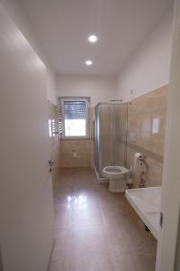 A bathroom at HOLYGOLD Suite ****