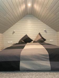 Krevet ili kreveti u jedinici u okviru objekta Holiday house Ausekļa namiņš
