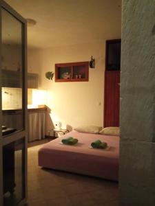 Posteľ alebo postele v izbe v ubytovaní Apartments Boćin Rosso