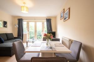 a living room with a table and chairs at No18 Nursery Convent in Mansfield