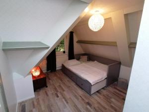 Un pat sau paturi într-o cameră la Chez Bob