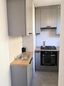 Kuchnia lub aneks kuchenny w obiekcie Apartament przy Starówce