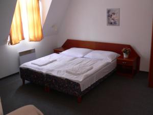 Postel nebo postele na pokoji v ubytování Hotel Armales