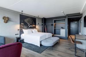 Radisson RED Aarhus客房内的一张或多张床位