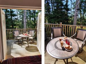 a patio with a table and chairs on a deck at Treetops in Newcastle upon Tyne