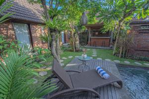 Ein Garten an der Unterkunft Tirta Bali Villa