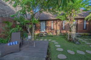 Ein Garten an der Unterkunft Tirta Bali Villa