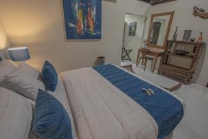 Ein Bett oder Betten in einem Zimmer der Unterkunft Tirta Bali Villa
