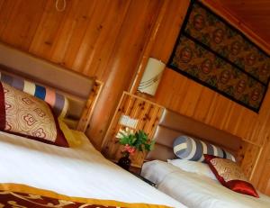 Postel nebo postele na pokoji v ubytování Bridge View Boutique Guesthouse 望桥楼精品民宿