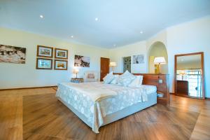 Postel nebo postele na pokoji v ubytování Pink Flamingo Boutique Hotel