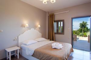 Foto da galeria de Mythos Suites Diskos em Lentas mais 171 fotos