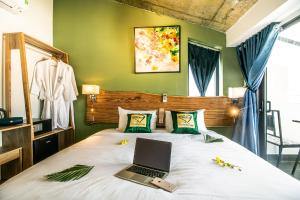 Postel nebo postele na pokoji v ubytování HOI AN HEART LODGE + 37 fotografií