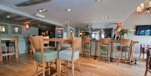 A restaurant or other place to eat at The Vernon 