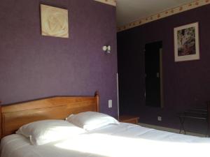 Postel nebo postele na pokoji v ubytování Hotel D'Albion