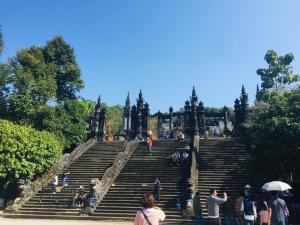 a group of people sitting on the stairs of a amphitheater at Ngoc Binh Hotel in Hue