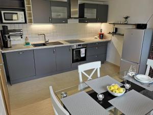 Кухня или мини-кухня в Ferienwohnung Andalucia
