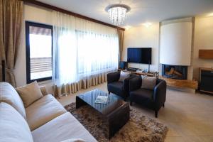 Televisyen dan/atau pusat hiburan di Lake View House