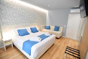 Postel nebo postele na pokoji v ubytování Nina B&B