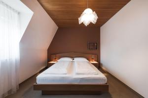 Posteľ alebo postele v izbe v ubytovaní Residence Désirée Classic & Design