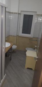Koupelna v ubytování Albergo Athena Mare + 14 fotografií