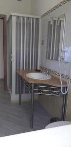 Postel nebo postele na pokoji v ubytování Albergo Athena Mare