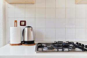 Kuchyň nebo kuchyňský kout v ubytování Apartment Piccolo