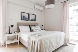Letto o letti in una camera di Superb & Comfy 2BD Apartment in Marousi by UPSTREET