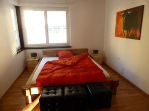 A bed or beds in a room at Penthouse Apartment in Vaduz