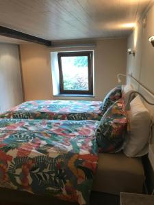 Ein Bett oder Betten in einem Zimmer der Unterkunft En mode Pause