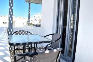A balcony or terrace at Naxos Enjoy Apartments