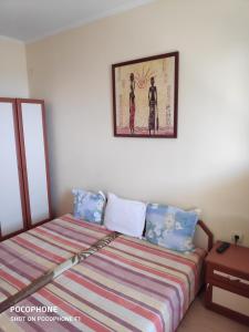 Postel nebo postele na pokoji v ubytování Homestay Kostadinov