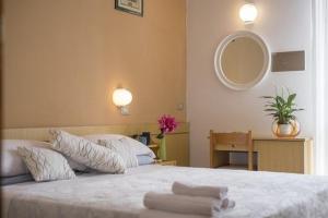 Postel nebo postele na pokoji v ubytování HOTEL VENUS