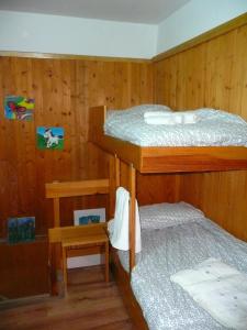 Postel nebo postele na pokoji v ubytování Appartamento Sole Alto