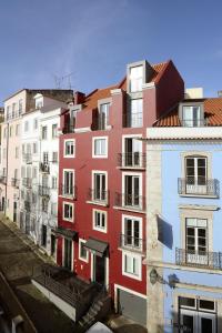 a group of tall buildings in a city at Dalma Old Town Suites in Lisbon