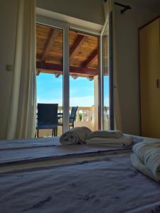 Postel nebo postele na pokoji v ubytování Apartman Karmen
