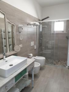 Koupelna v ubytování Hotel Villa Esedra