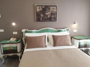 Postel nebo postele na pokoji v ubytování Hotel Villa Esedra