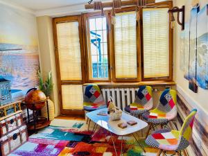 a living room with chairs and a table at Nemezis in Ustka