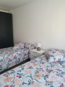 Postel nebo postele na pokoji v ubytování Appartement Cime l'Est