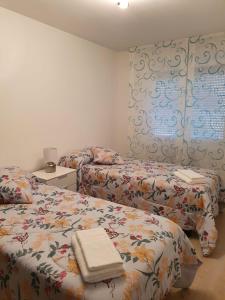 Postel nebo postele na pokoji v ubytování Appartement Cime l'Est
