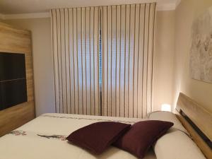 Postel nebo postele na pokoji v ubytování Appartement Cime l'Est