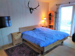 Кровать или кровати в номере Country Appartement Lungau