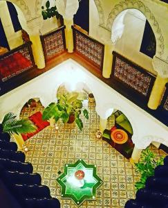 an overhead view of a room with a theater at Riad Adriana in Marrakesh