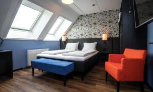 Ліжко або ліжка в номері Thon Hotel Tromsø