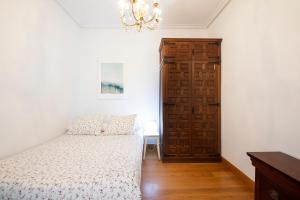 A bed or beds in a room at Beach & City - Neighbourhood of Gros