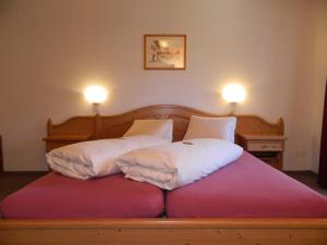 Voodi või voodid majutusasutuse Hotel Preda Kulm toas