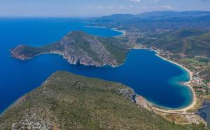 an aerial view of the islands and the water at Notia Luxury Living in Porto Koufo