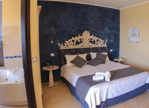Postel nebo postele na pokoji v ubytování Janus Hotel